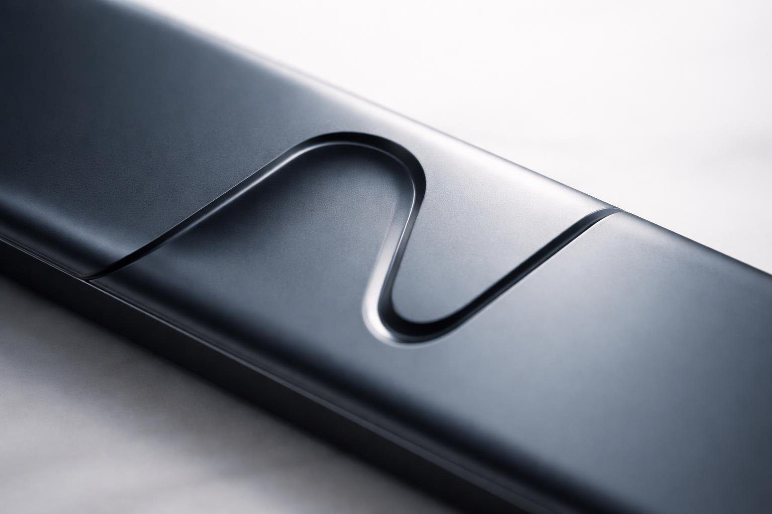 Objeto moderno com a letra 'n' integrada, em fundo neutro e iluminação suave.